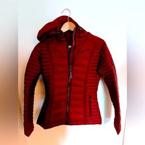 Red Hooded Kuhl jacket with hood
